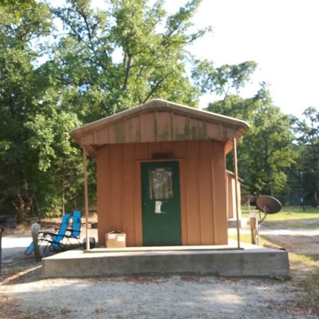 A quant, fisherman's cottage nestled in natural beauty at 429 Resort & Marina in Quinlan, TX.