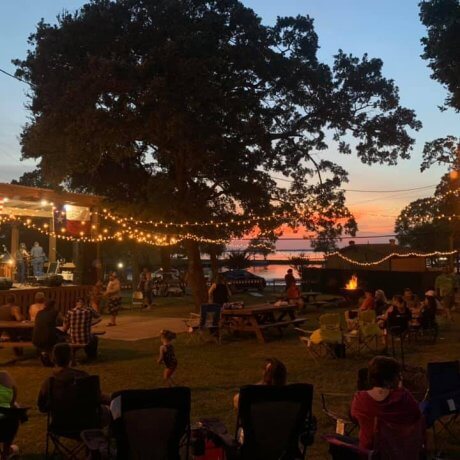 A family laughing together as they enjoy the family-friendly activities at 429 Resort & Marina in Quinlan, TX.