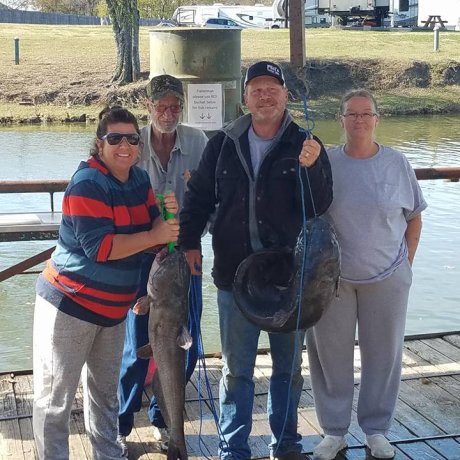 Fishing on the calm waters of Lake Tawakoni, illustrating the outdoor adventure right outside your door at 429 Resort & Marina in Quinlan, TX.