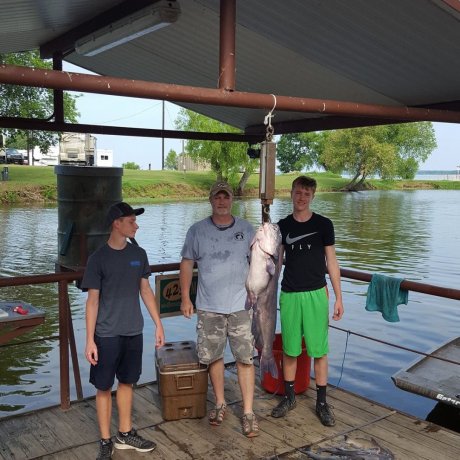 Fishing on the calm waters of Lake Tawakoni, illustrating the outdoor adventure right outside your door at 429 Resort & Marina in Quinlan, TX.