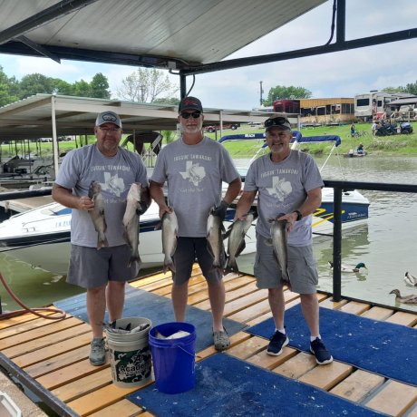 Fishing on the calm waters of Lake Tawakoni, illustrating the outdoor adventure right outside your door at 429 Resort & Marina in Quinlan, TX.