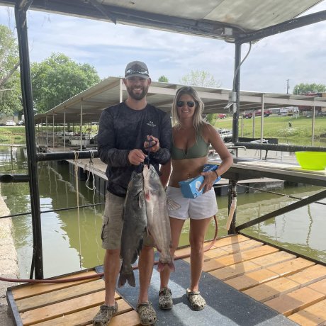 Fishing on the calm waters of Lake Tawakoni, illustrating the outdoor adventure right outside your door at 429 Resort & Marina in Quinlan, TX.